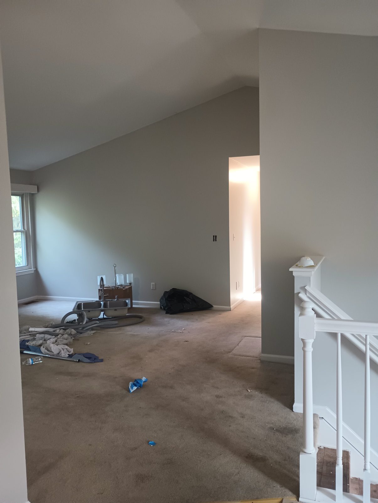 Same living room after repaint in warm gray